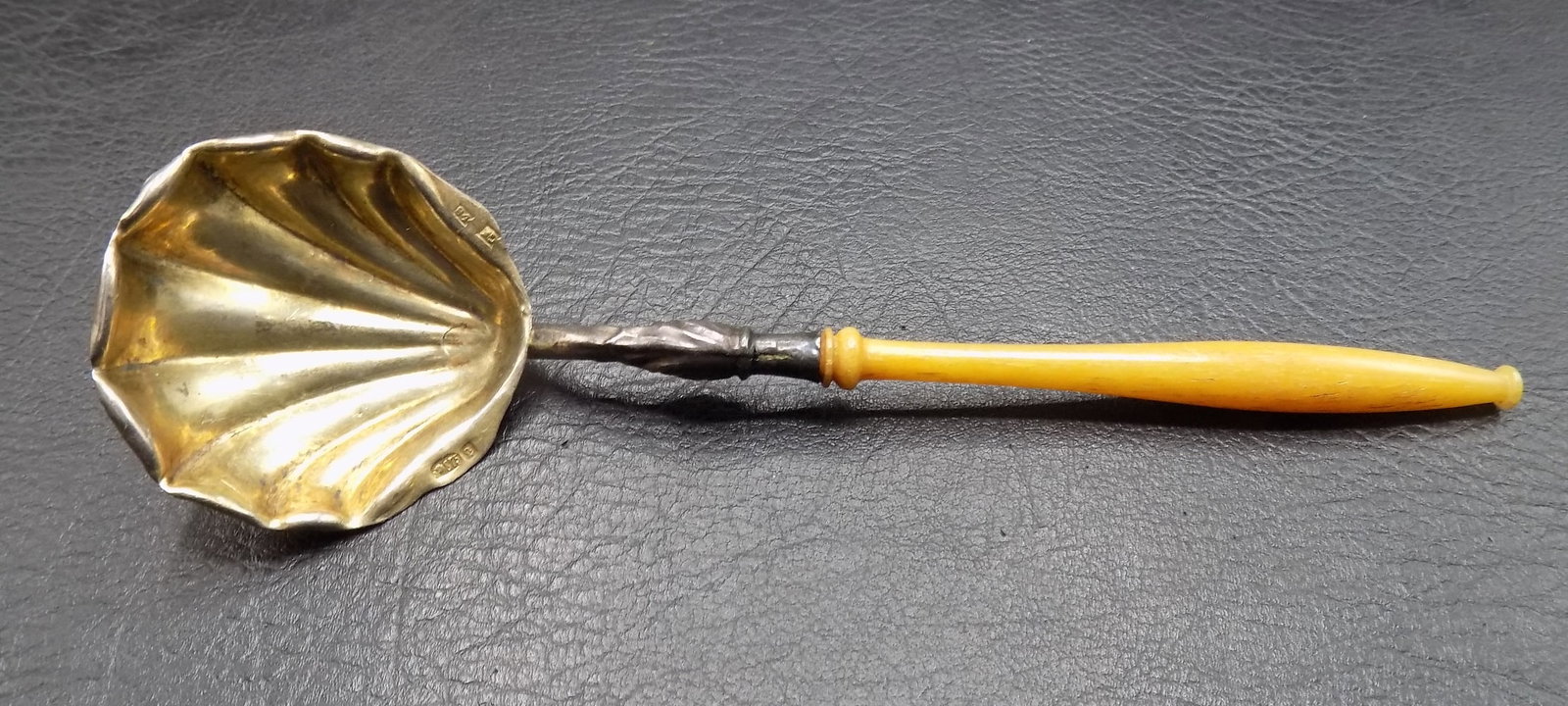 Vintage Russian Imperial gold wash 875 silver shell bowl sugar spoon: Vintage Russian Imperial gold wash 875 silver shell bowl sugar spoon. Marked 84 as shown in photo . Measures 5 ½ inches. 10.8 grams. In very good original as found condition. Great quality and de