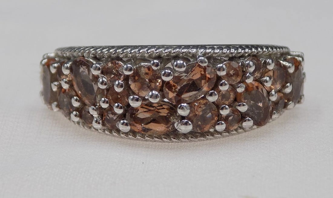 Beautiful 3 cwt smoky topaz and citrine sterling silver ring: Beautiful 3 cwt smoky topaz and citrine sterling silver ring. Size 8. For in house shipping, please call Mike at Thriftiques 319-321-0613 . Click the preferred shipping method for in house shipping
