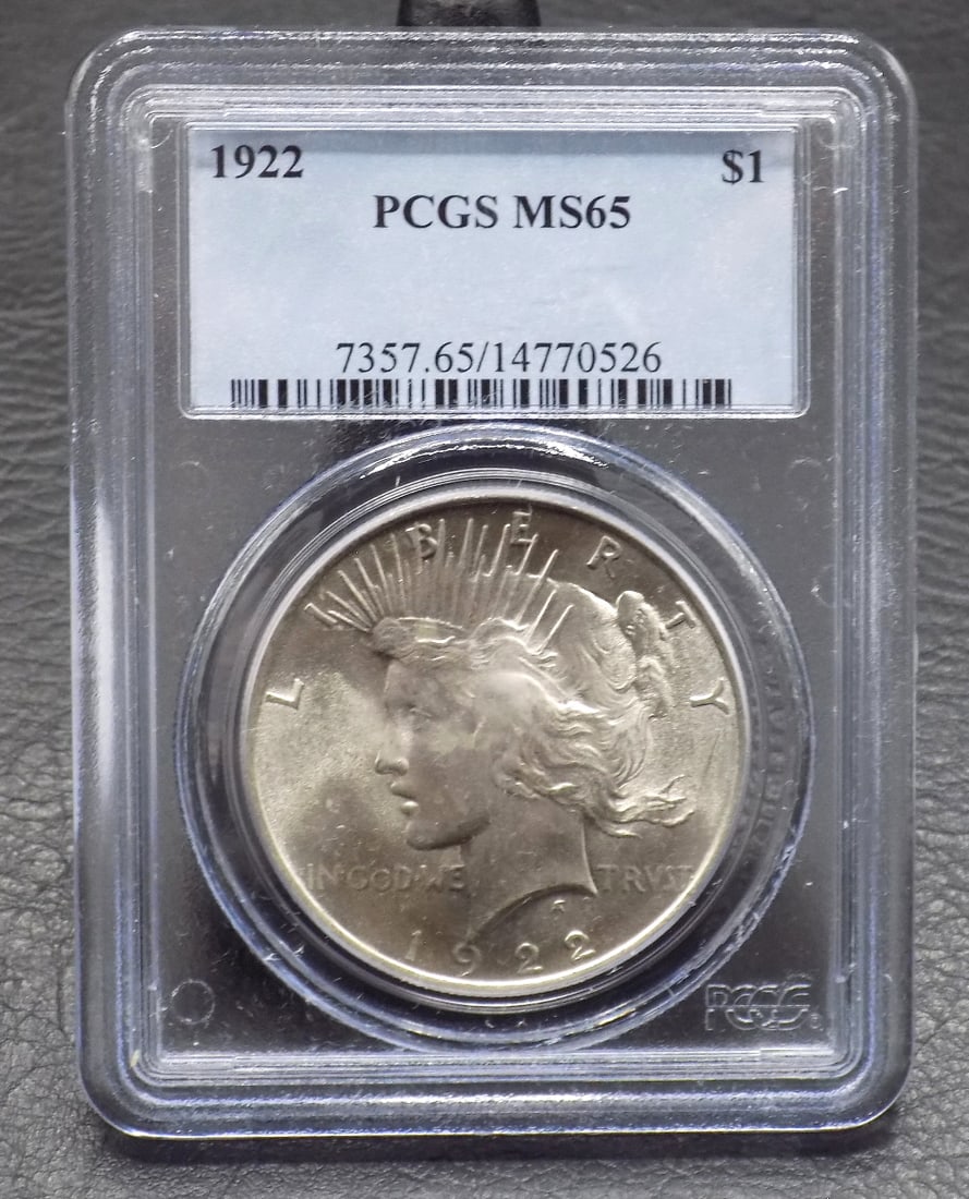 Uncirculated 1922 silver dollar MS65 graded by PCGS (1 of 2)