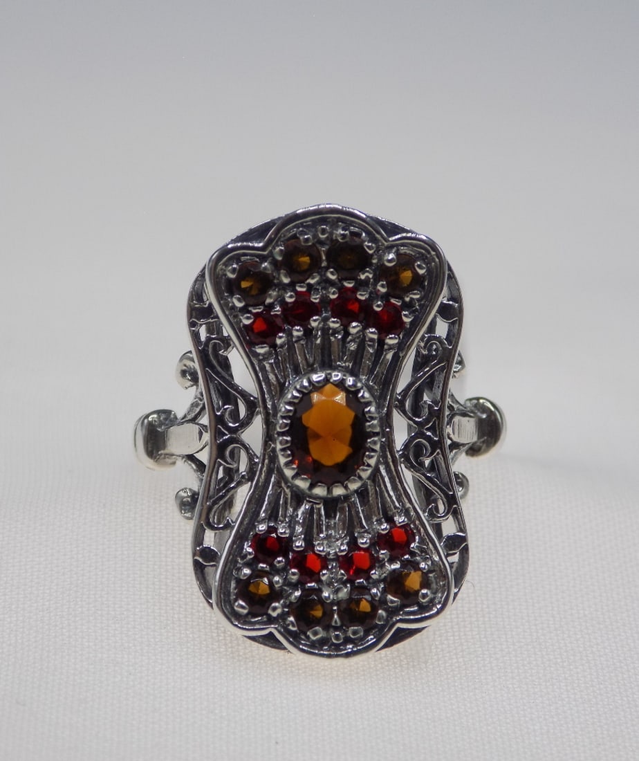 Beautiful 1 cwt. smoky topaz sterling silver ring: Beautiful 1 cwt. smoky topaz sterling silver ring. Lab created. Size 6. For in house shipping, please call Mike at Thriftiques 319-321-0613. Click the preferred shipping method for in house shipping