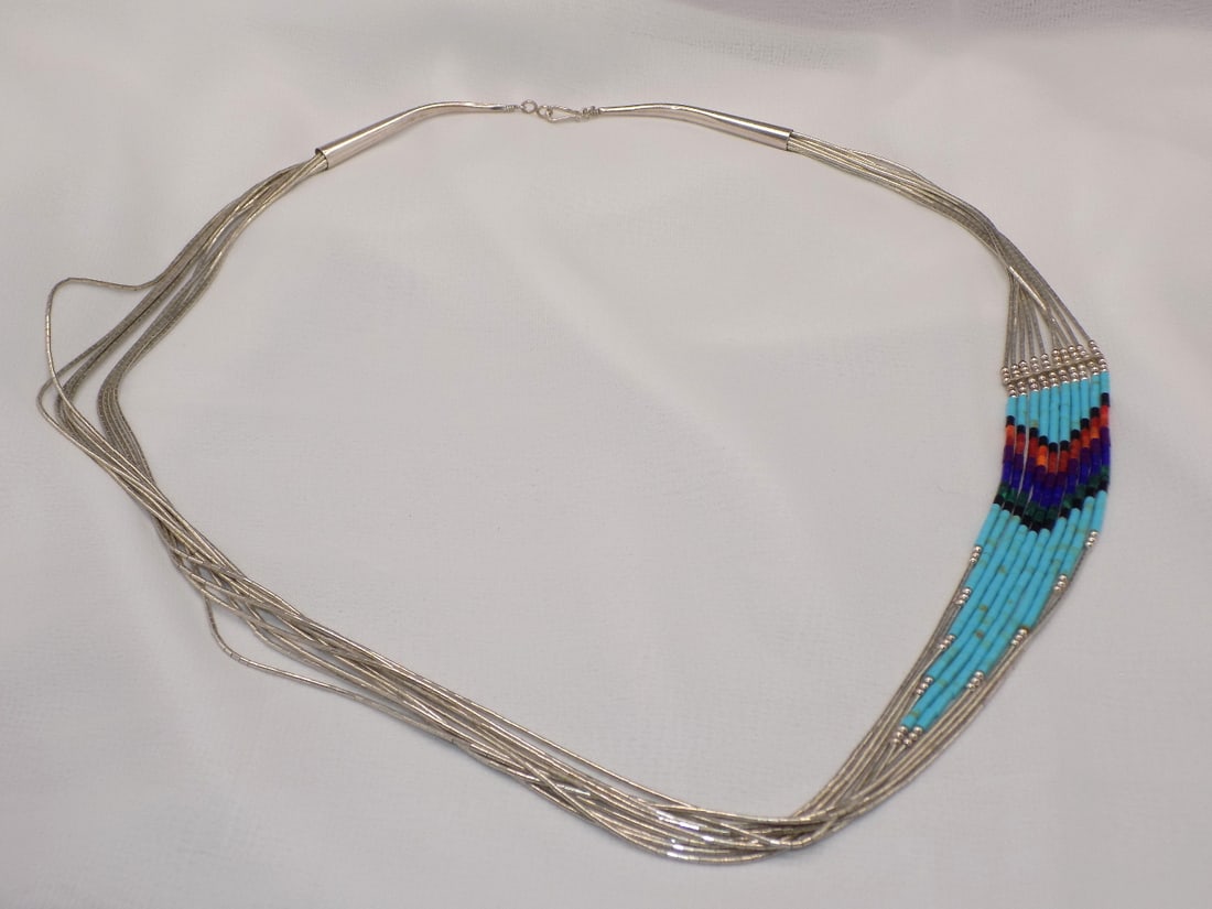 Vintage Native American Indian sterling silver necklace with turquoise, coral and lapis: Vintage Native American Indian sterling silver necklace with turquoise, coral and lapis. Beautiful colors. In very good original as found condition. Great quality and detail. Length opened 26 ½ i