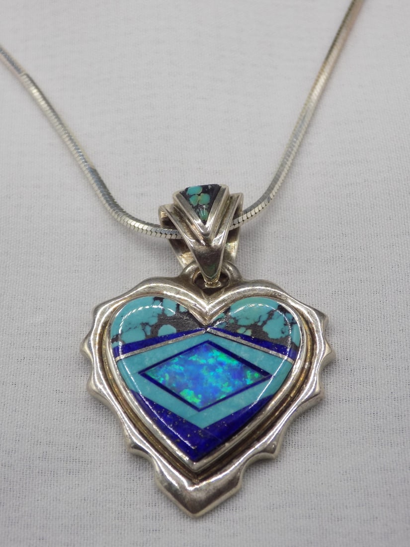 Beautiful Native American Indian Navajo vintage opal and azurite sterling pendant: Beautiful Native American Indian Navajo vintage opal and azurite sterling pendant. Signed Rich Tolins. Marked on back as shown in photo. Beautiful colors. In very good original as found condition. Gre