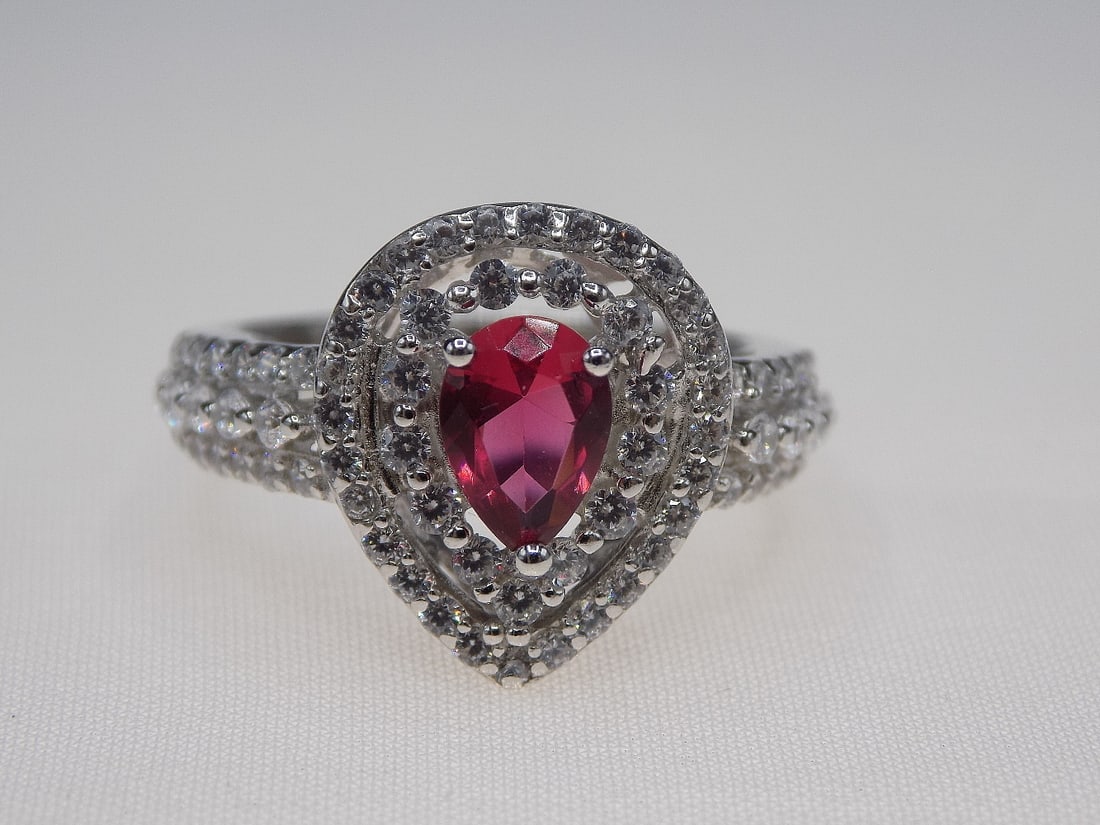 Beautiful 4 cwt ruby and topaz sterling silver ring. (1 of 4)