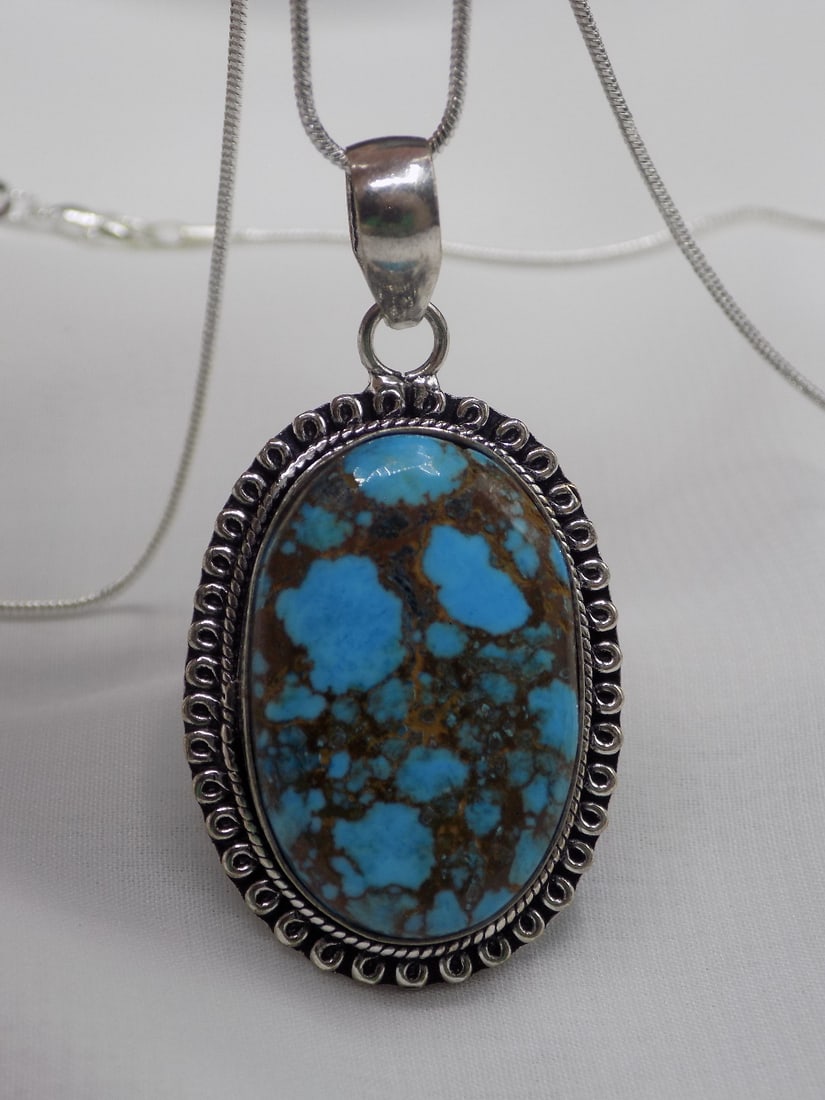 Native American Indian turquoise sterling silver pendant necklace: Native American Indian turquoise sterling silver pendant necklace. Beautiful colors. In very good original as found condition. Great quality and detail. Pendant 2 inches long x 1 wide. Necklace 20 inc