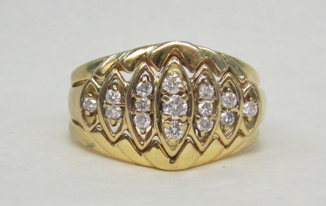 Beautiful 14 K Diamond ring, 1/2 CT. Size 9.5. Weighs: Beautiful 14 K Diamond ring, 1/2 CT. Size 9.5. Weighs 7 Grams.