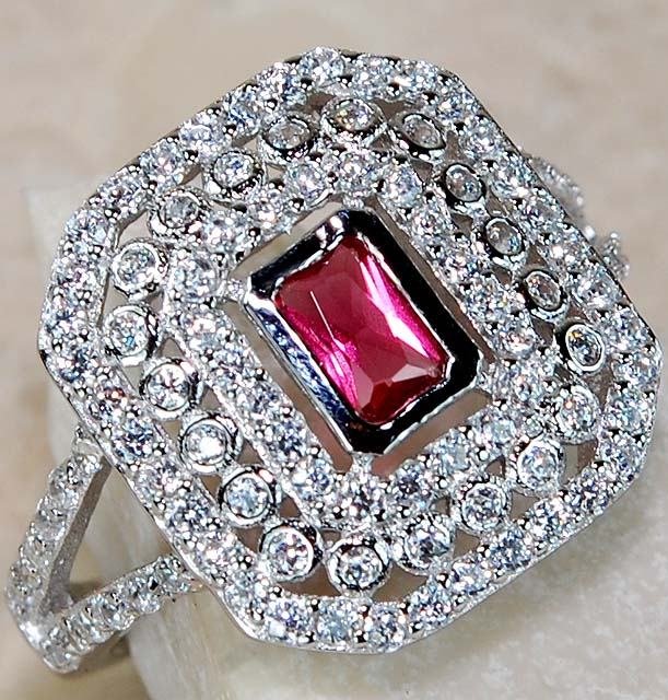 Genuine Ruby, White Topaz & 925 Sterling Silver Ring: Genuine Ruby and White Topaz & .925 SOLID STERLING SILVER ladies ring,size 6. stamped .925