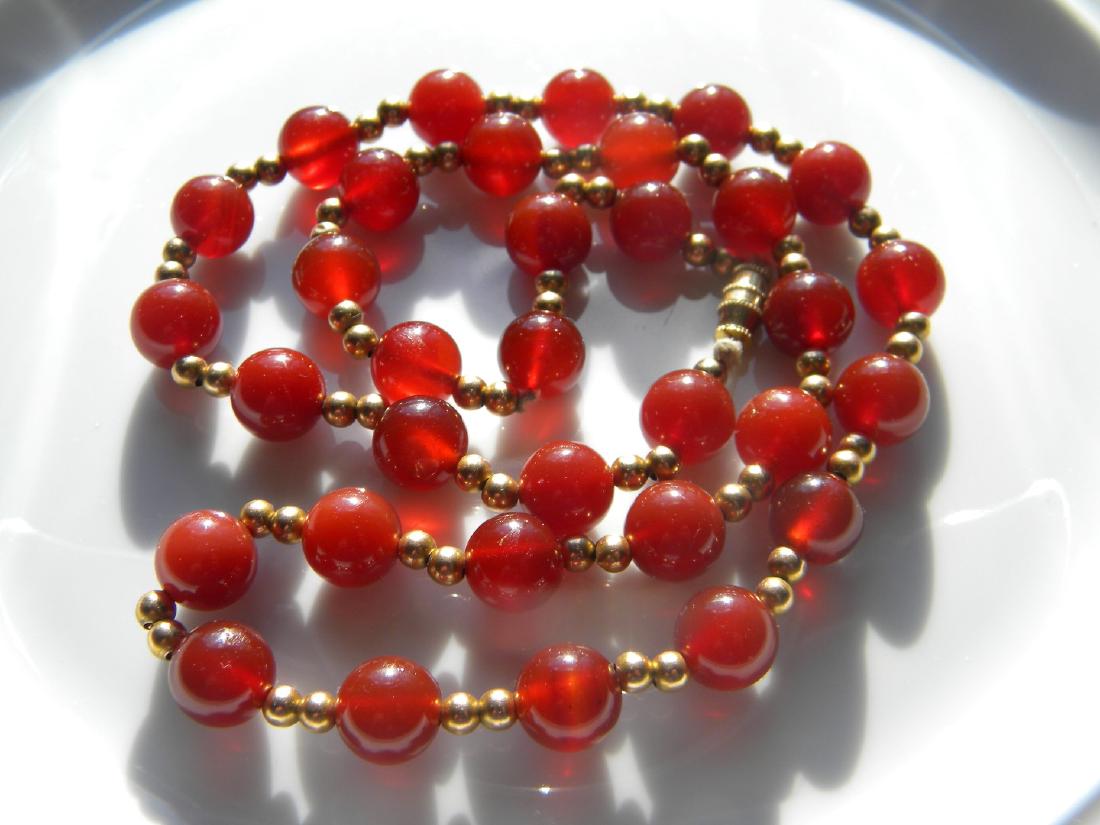 Antique Chinese Carnelian Necklace: Antique Chinese Carnelian Necklace, length 22", size of the bead 10.28mm