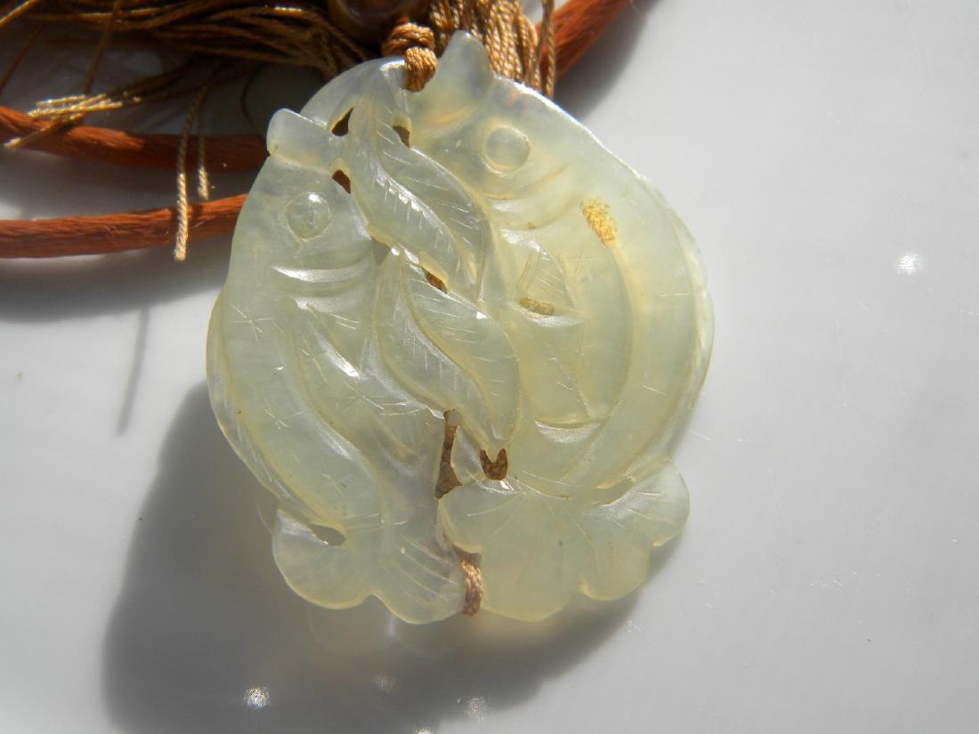 Double fish jade pendant deals