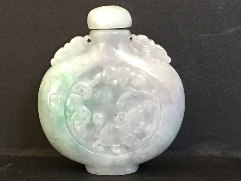 Carved jadeite snuff bottle (1 of 4)