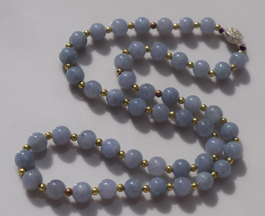 A NATURAL PURPLE JADEITE NECKLACE (1 of 4)