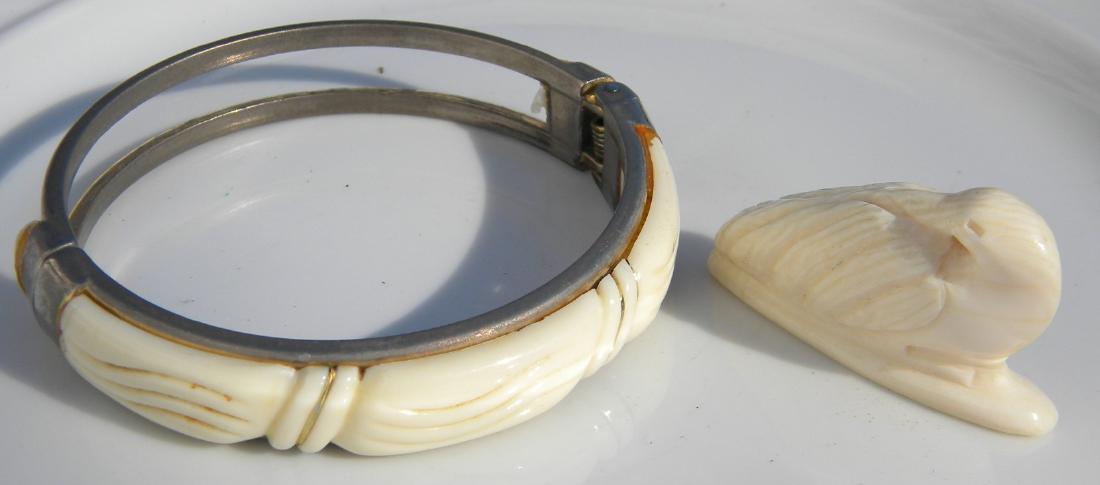 Pair of Carved Bracelet and Bird Statue (1 of 4)