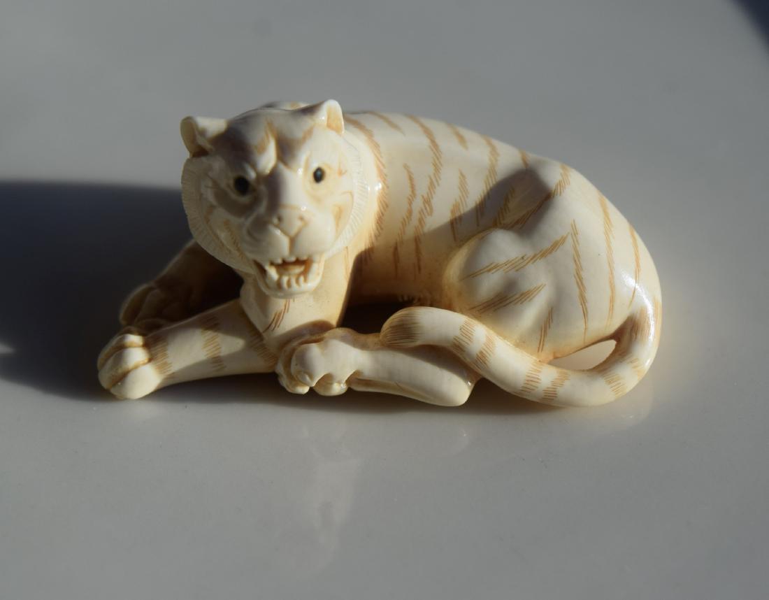 Antique Carved Tiger Netsuke (1 of 3)