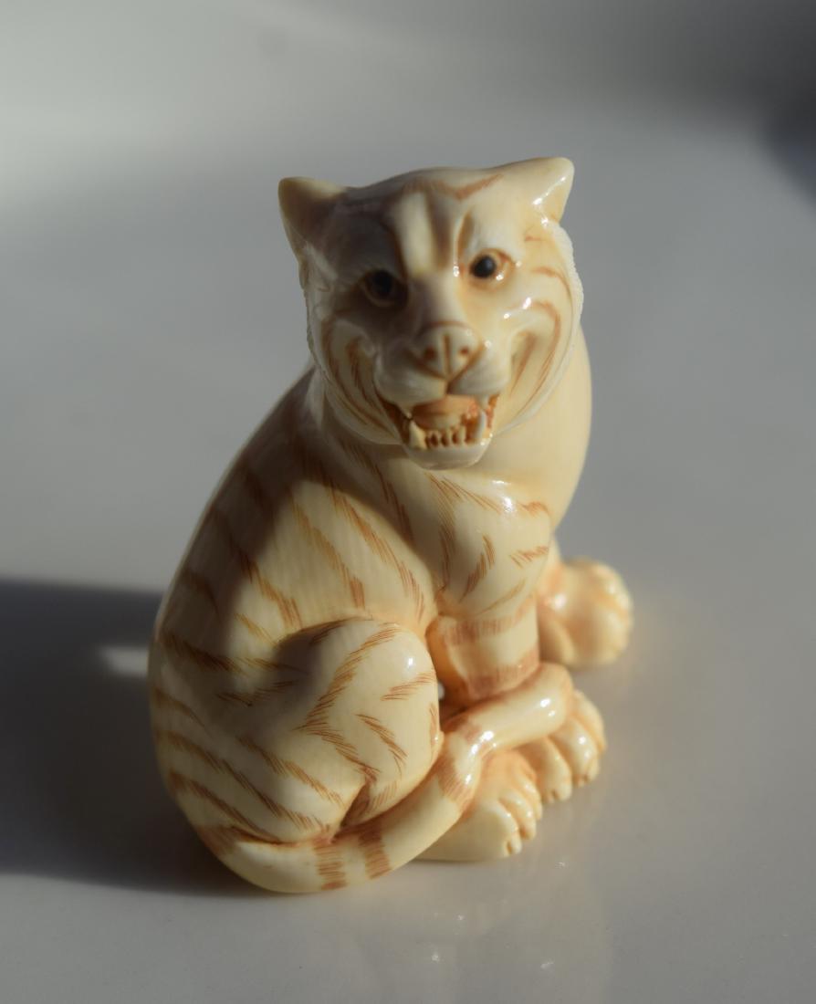 Antique Carved Tiger Netsuke (1 of 3)