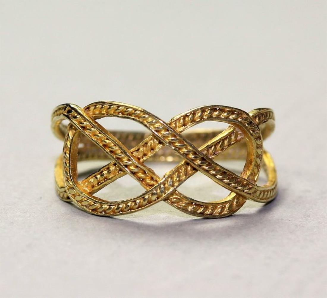 Chinese 14K Gold Ring, ring size is 8, 3/8" high-widest: Chinese 14K Gold Ring, ring size is 8, 3/8" high-widest part in front of the ring, with twisted Eternal Macrame design, the condition is good.
