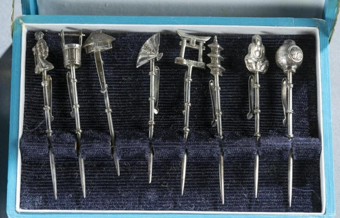 Set of Silver Eight Asian cocktail picks. Each one (1 of 1)