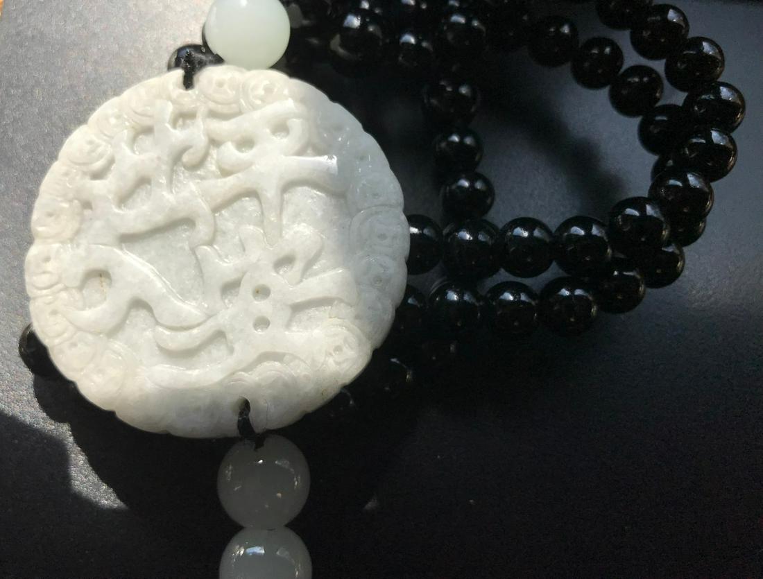 Necklace with black beads on chain with white beads and (1 of 3)