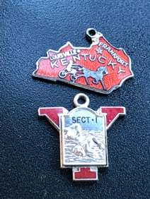 Two Silver Pendants