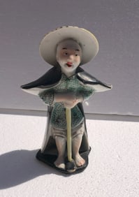 Antique Porcelain Statue