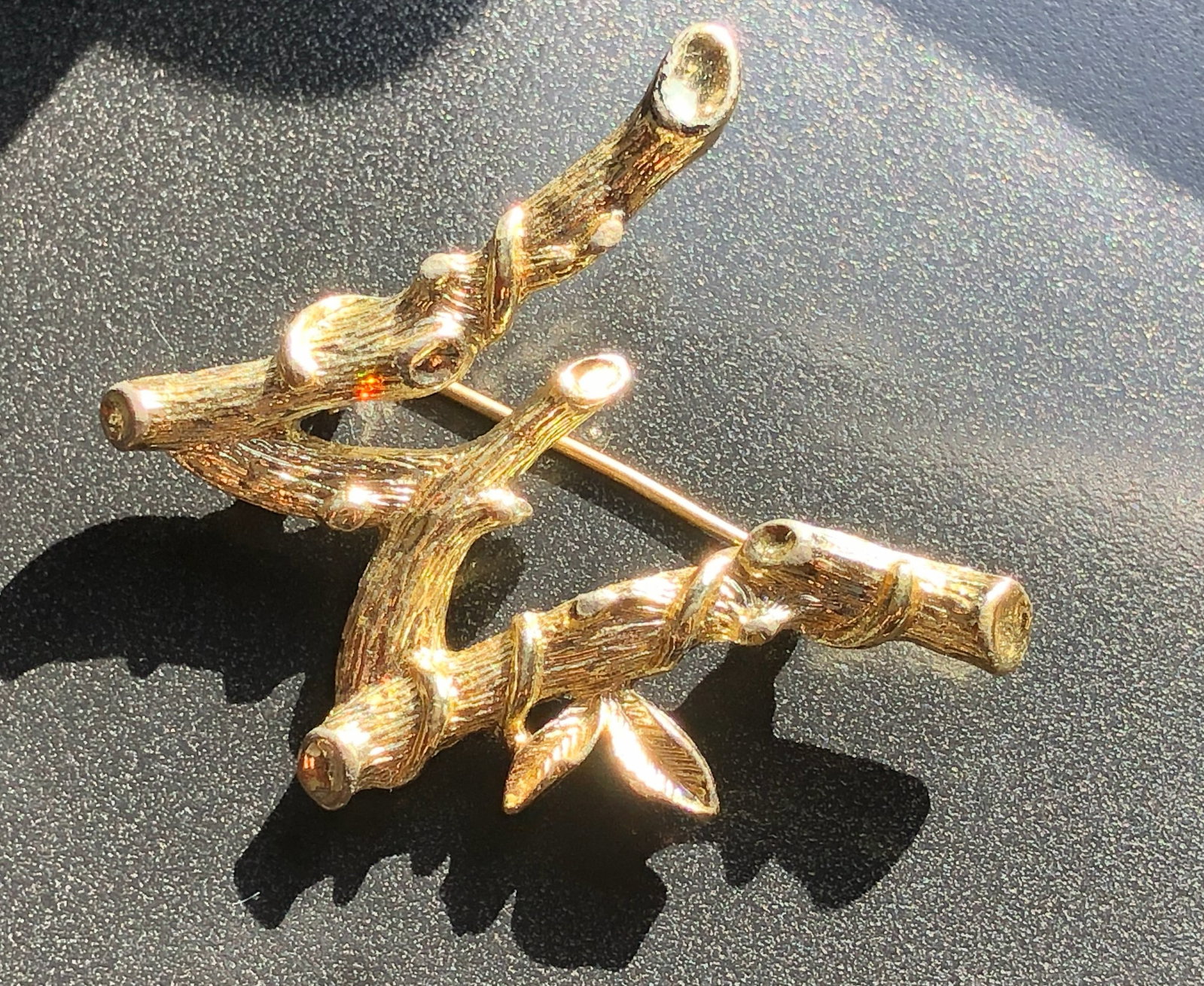 Gold Filled Branch Brooch: A beautifully crafted gold filled branch brooch, perfect for adding a touch of elegance to any outfit.