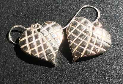 pair of earings, silver heart design