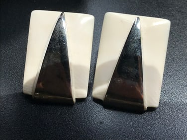 pair of earings, square design with 3 triangles on each, white and black