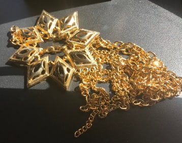 a snowflake pendant with chain