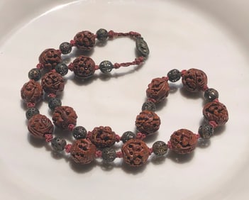 Antique chinese Carved Pitnut Necklace