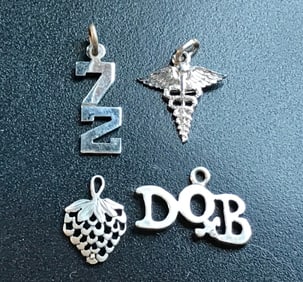 set of 4 Silver pendants