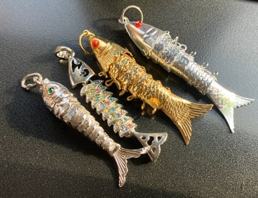 Four Fish Pendants