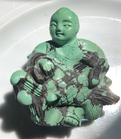 Antique Turquoise Carved Boy Holding a Fish, Size 2.5" x 2.25"