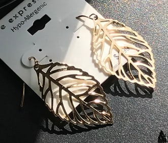 pair of earings, artistic open leaf design