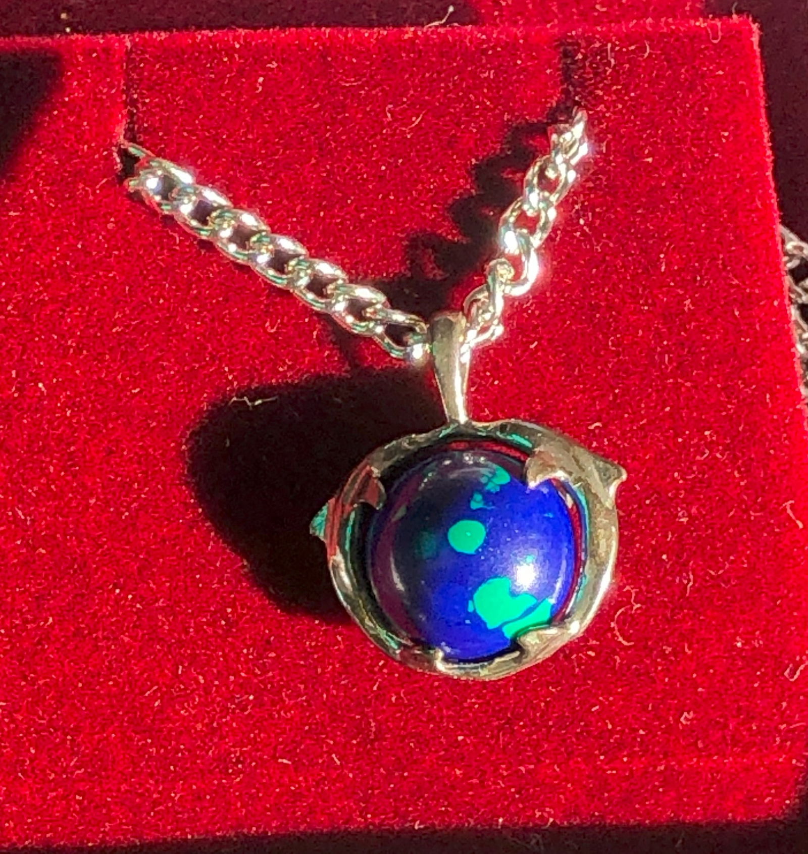 Blue Pendant Necklace: A stunning blue pendant set in a silver chain, perfect for any occasion.