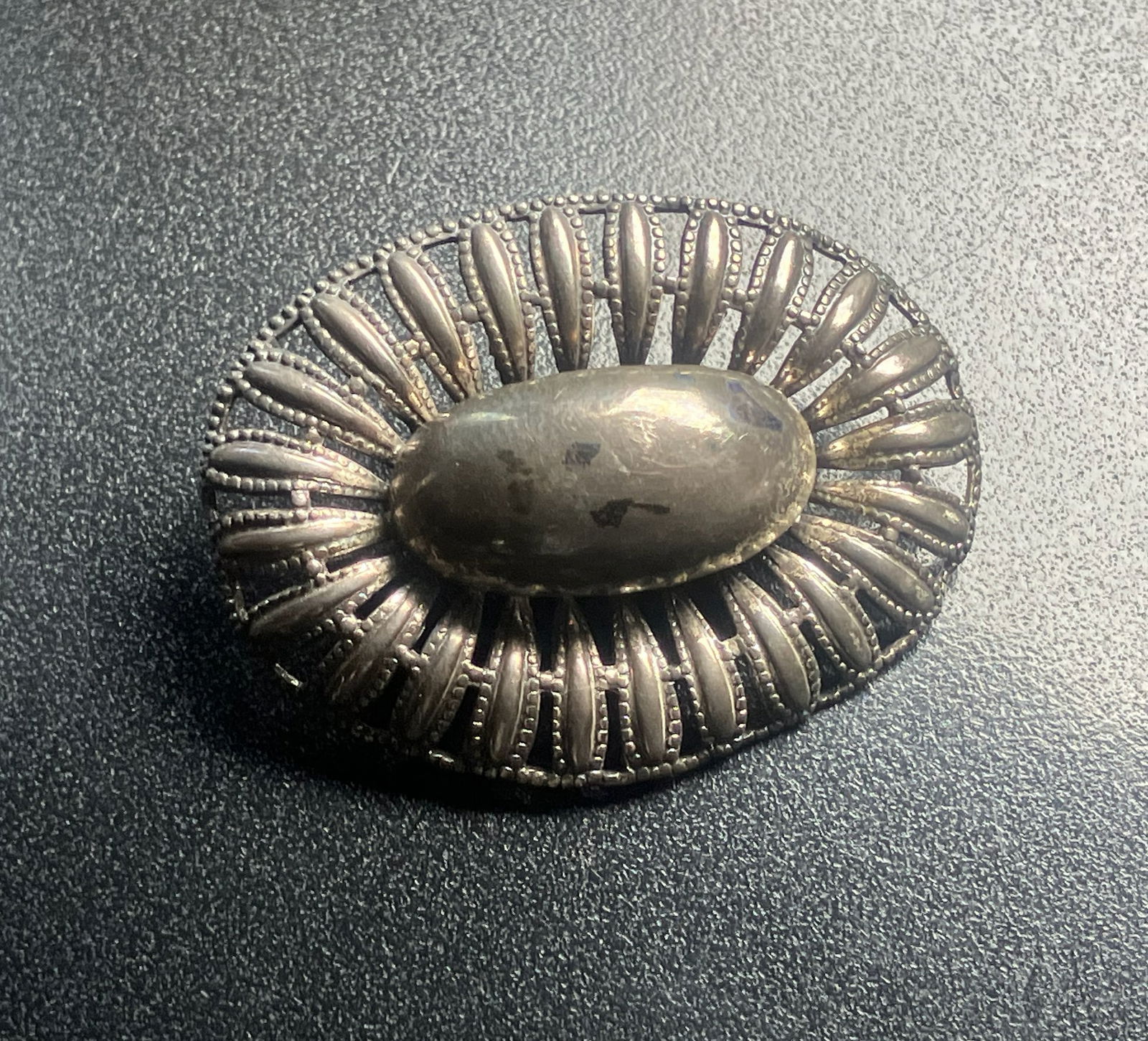 Vintage BEAU Silver Brooch: A beautifully crafted vintage BEAU silver brooch with intricate detailing.