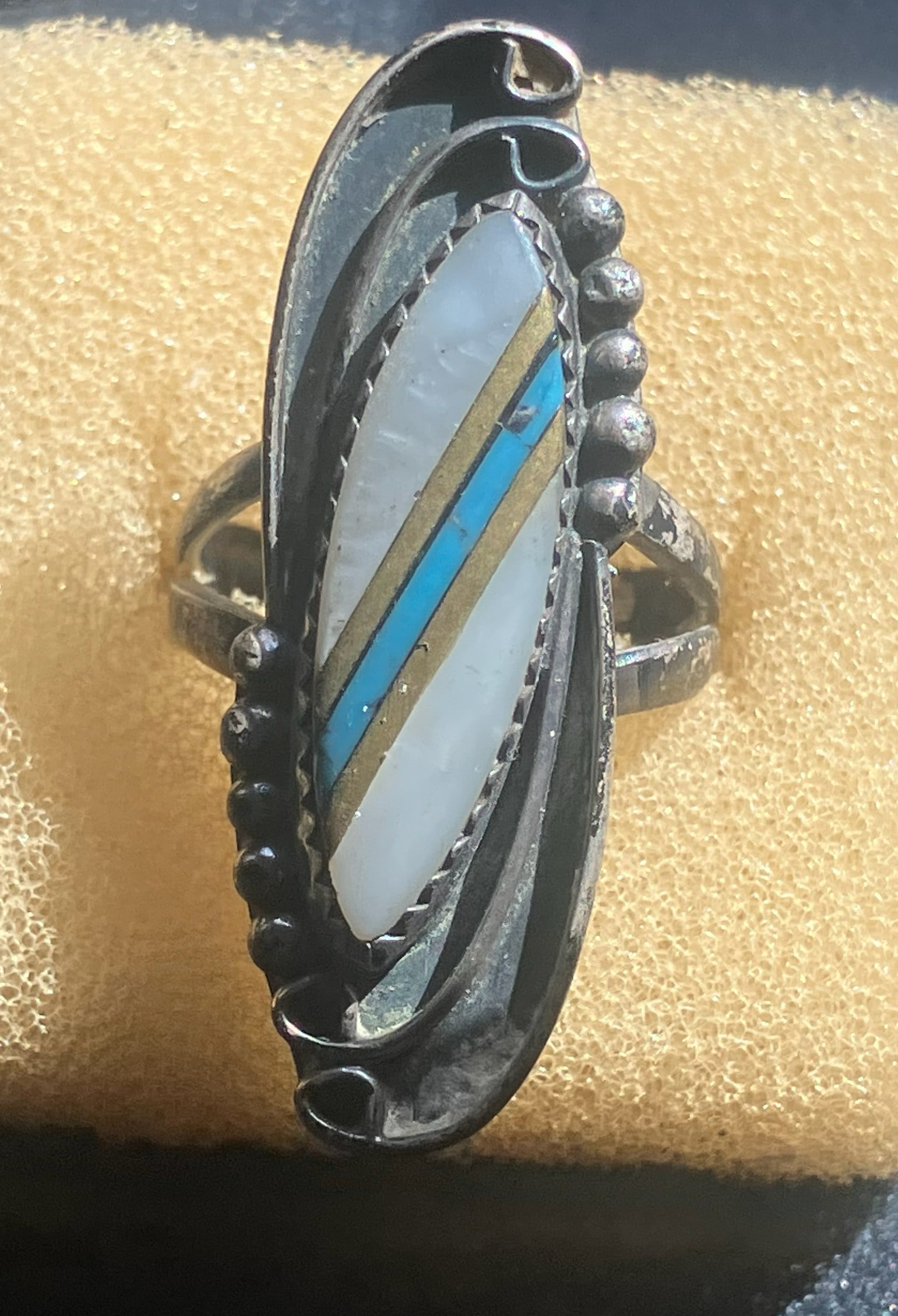 Vintage Silver Ring: A beautifully crafted vintage silver ring with intricate inlay design. Size 6.