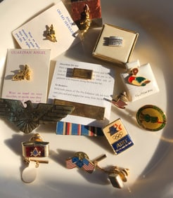 Group of pins, some military