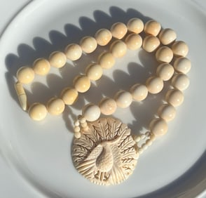 Vintage Carved Necklace with Peacock Pendant