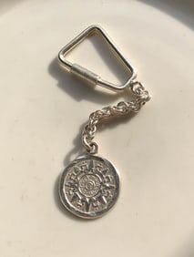 Silver Keychain with Sun Medallion