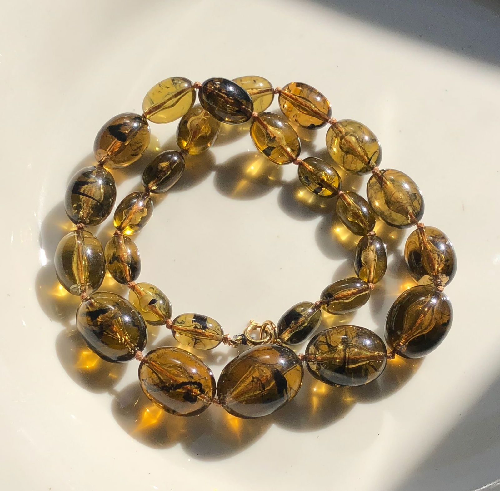 Amber Color Necklace: A beautiful amber color necklace with polished beads, Length: 18".