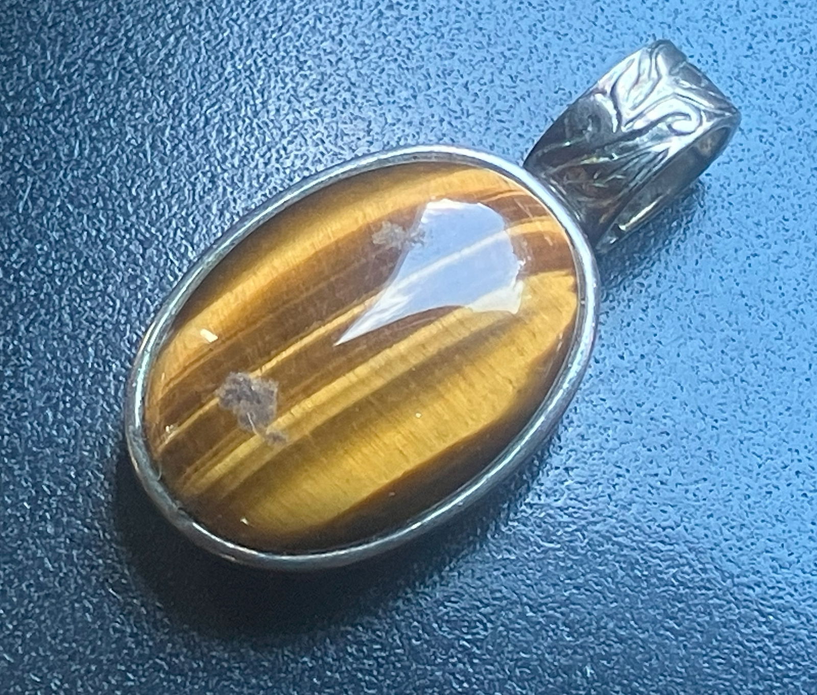 Tiger's Eye Silver Pendant: A beautiful Tiger's Eye gemstone pendant with a silver setting, Size: 1.5"
