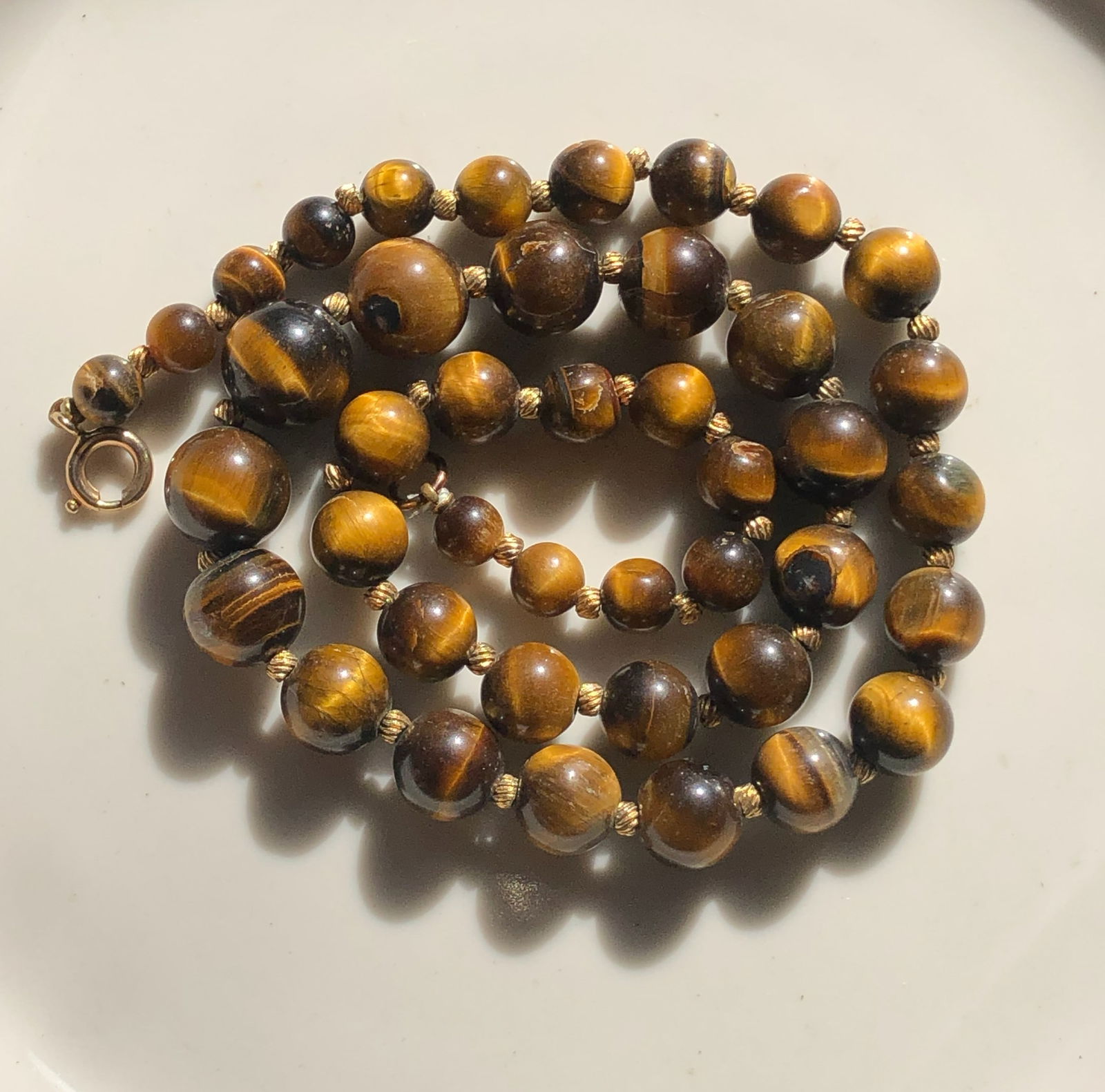 Tiger Eye Beaded Necklace: A beautiful tiger eye beaded necklace with a classic clasp, Length: 19"