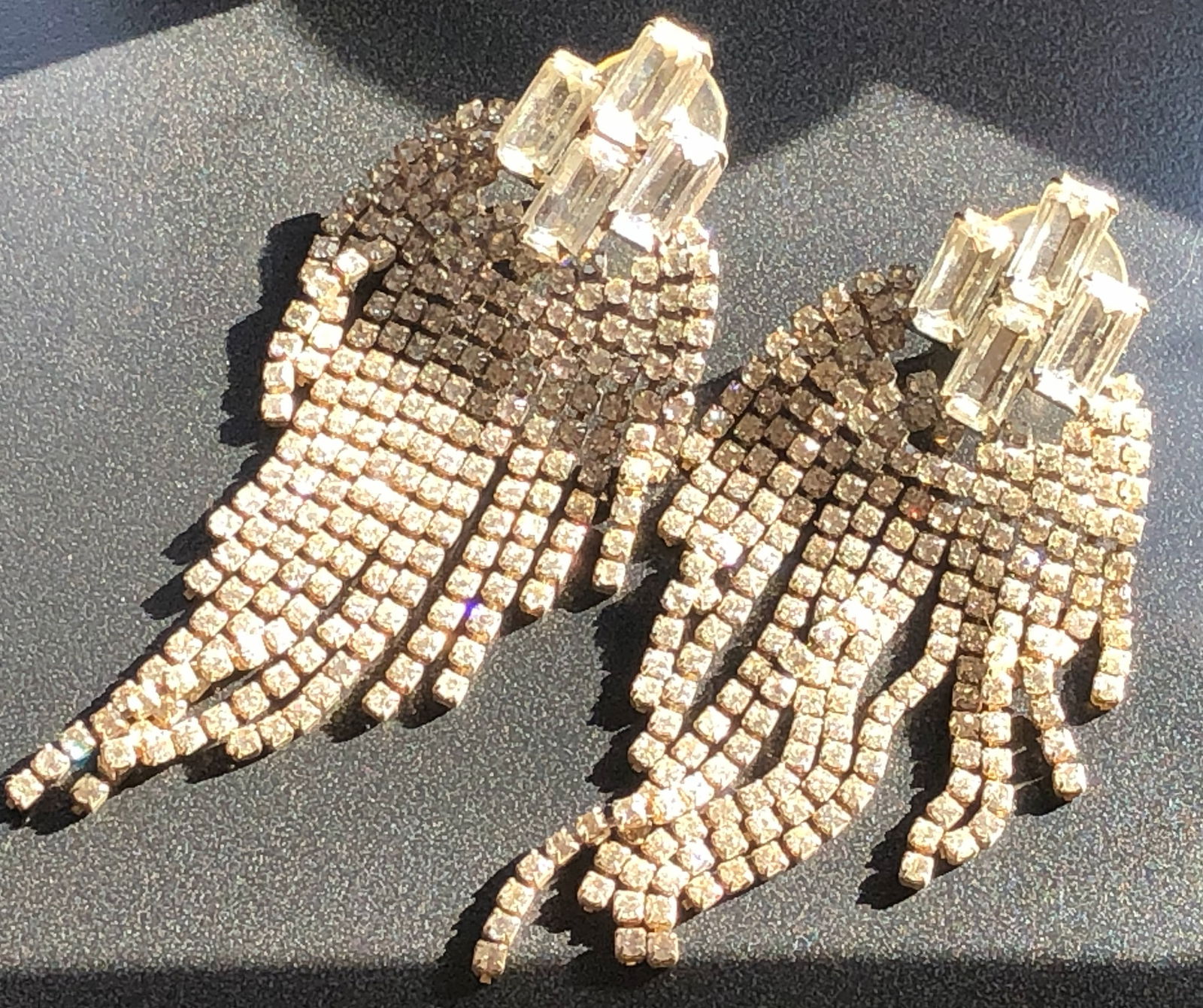 Elegant Crystal Earrings: Stunning crystal earrings with a cascading design, perfect for special occasions.