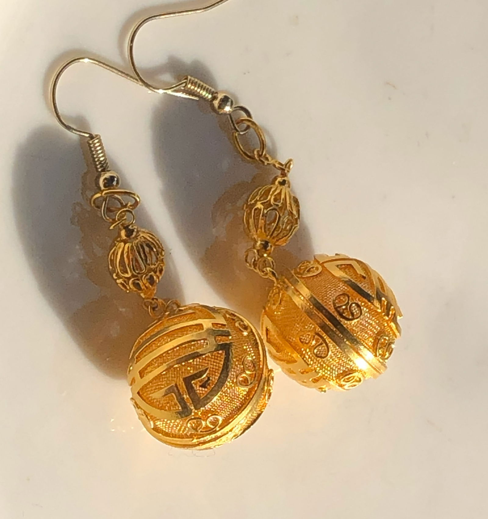 Gold Filled Filigree Earrings: Elegant gold filled filigree earrings with intricate design.