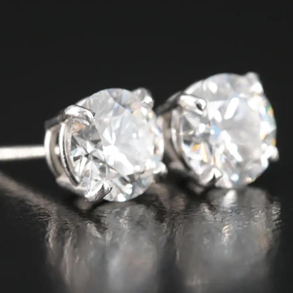 Platinum 3.65 CTW D VS1 Diamond Stud Earrings with IGI Reports: Platinum 3.65 CTW Lab Grown Diamond Stud Earrings with IGI Reports Primary Stone No.1: Details: Lab Grown Primary Stone(s) Shape: Round Brilliant Cut Primary Stone(s) Dimensions: 7.8- 7.82 ? 4.84 mm T