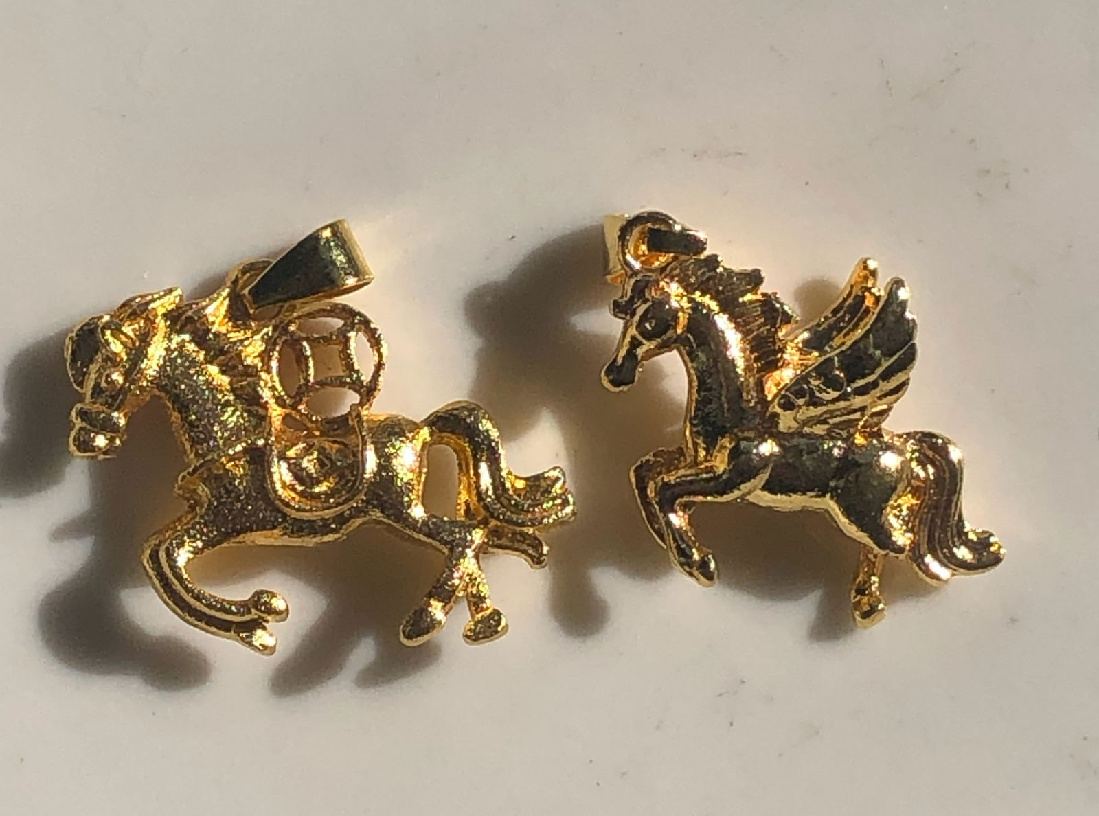 Two Gold Plated Horse Pendants: Two Gold Plated Horse Pendants