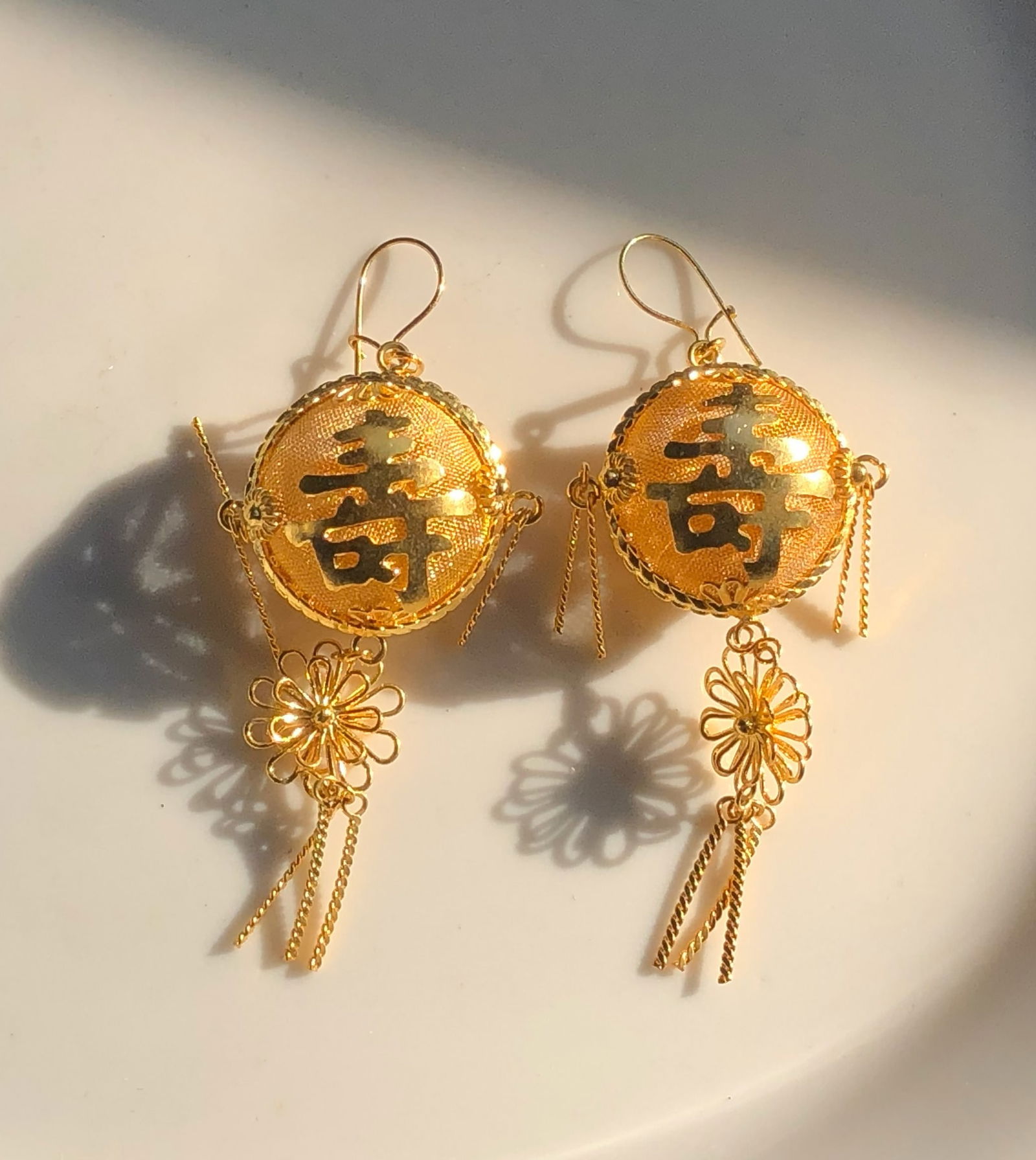 Gold Filled Chinese Character Earrings: Elegant gold Filled earrings featuring intricate Chinese character designs.