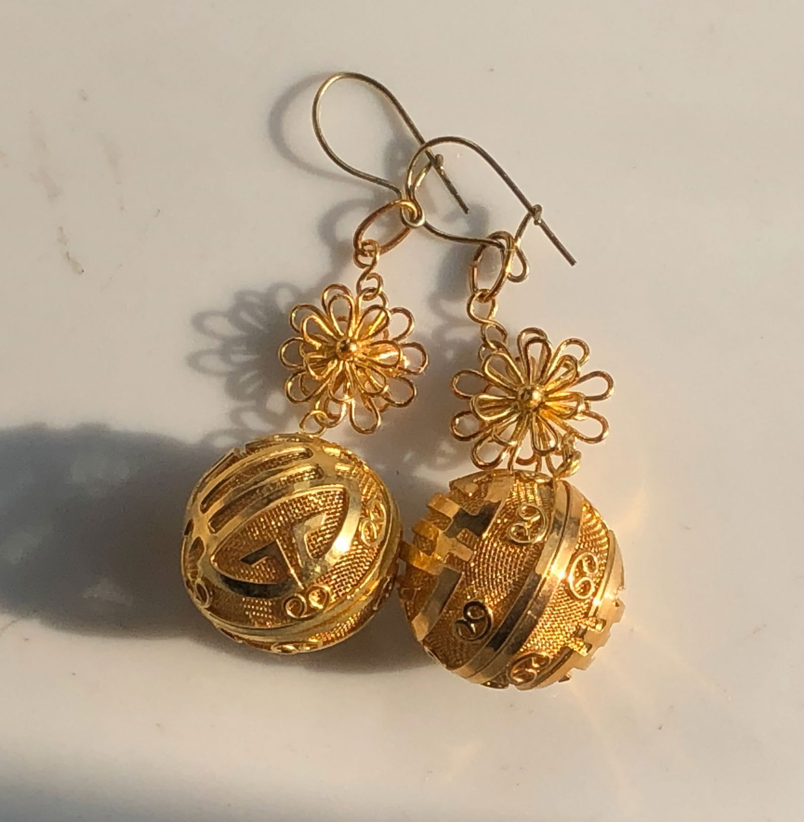 Gold Filled Filigree Earrings: Elegant gold filled filigree earrings with intricate design.