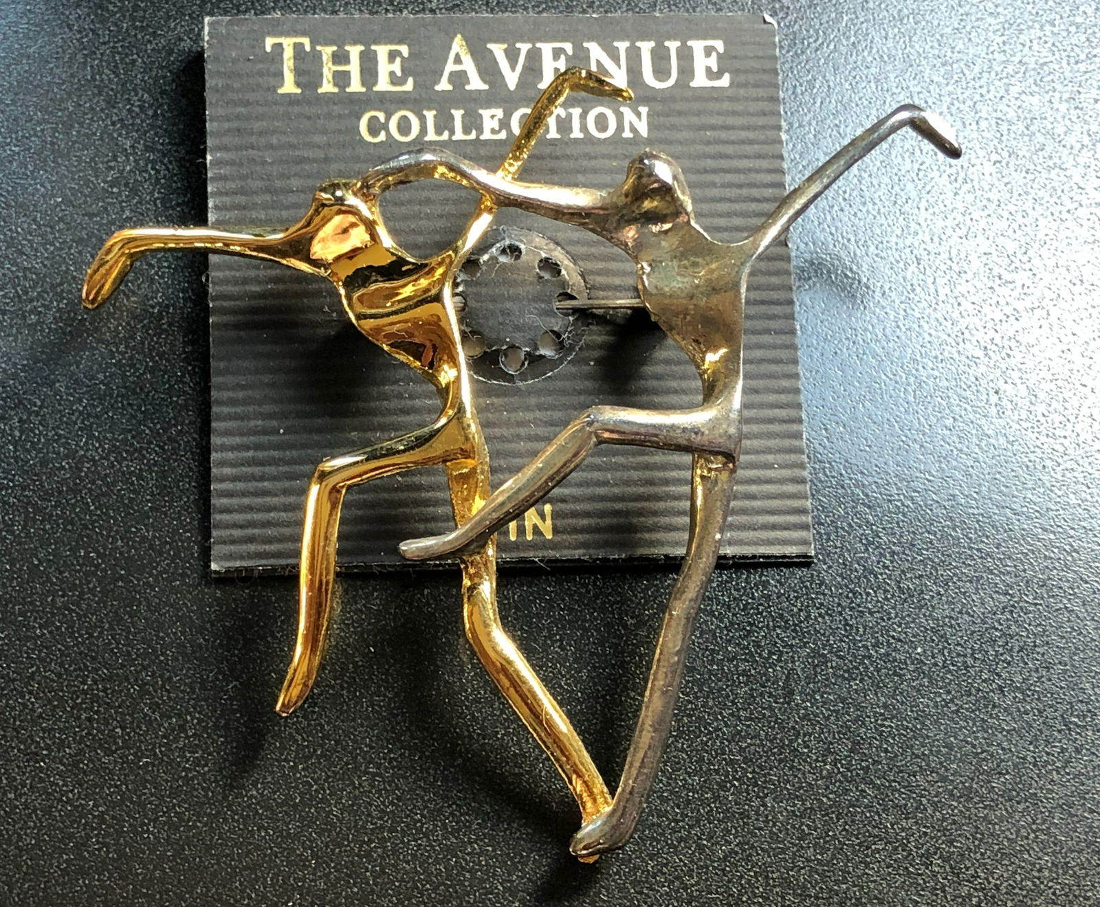 The Avenue Collection Dancing Figures: Elegant dancing figures from The Avenue Collection, perfect for home decor.