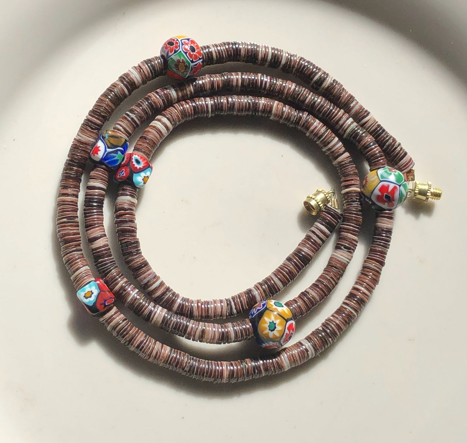 Beaded Necklace: A handcrafted beaded necklace with colorful beads.