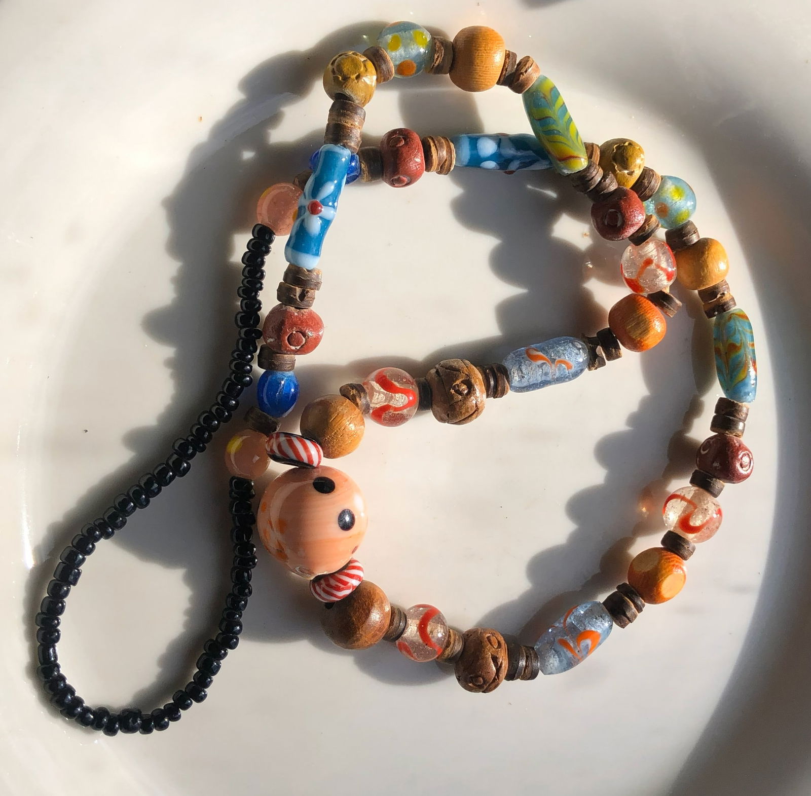 Colorful Beaded Necklace: A vibrant and unique beaded necklace featuring a variety of colorful beads.