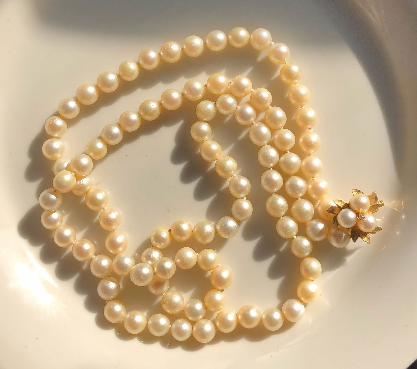 14K Gold and Diamond Pearl Necklace: 14K Gold and Diamond Pearl Necklace, Length: 32", size of each pearl: 8mm